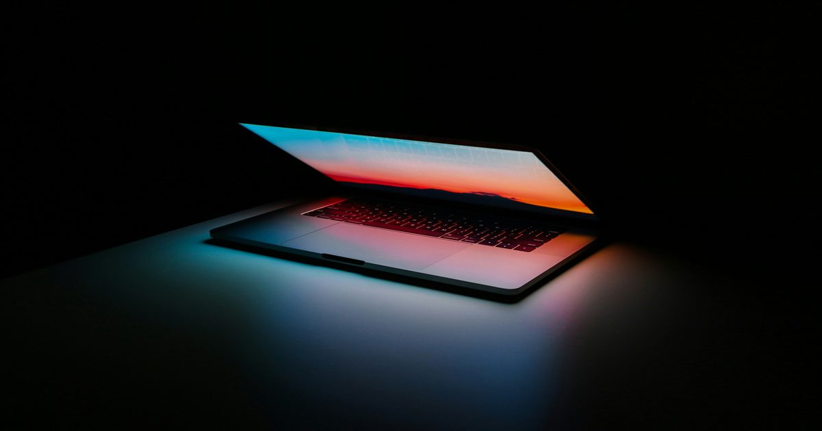 A laptop running an AI assistant, illustrating the difference between consumer and commercial AI